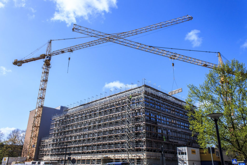 Cranes lifting materials
