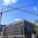 Cranes lifting materials